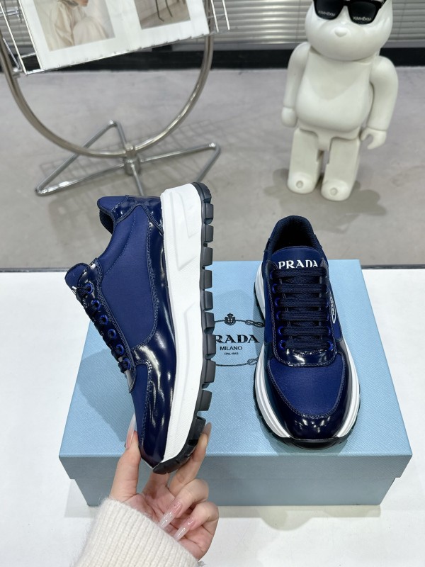 2025 Women Prada Blue Leather Sneakers KFY00310